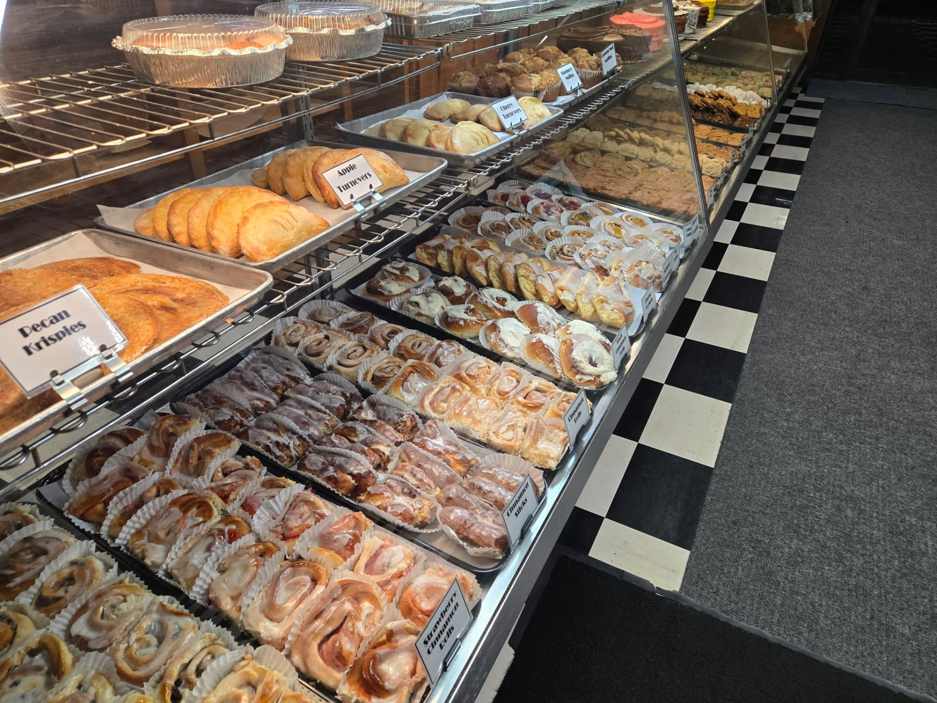 Mi-Lady Bakery pastry case with rolls and pastries in Downtown Tifton